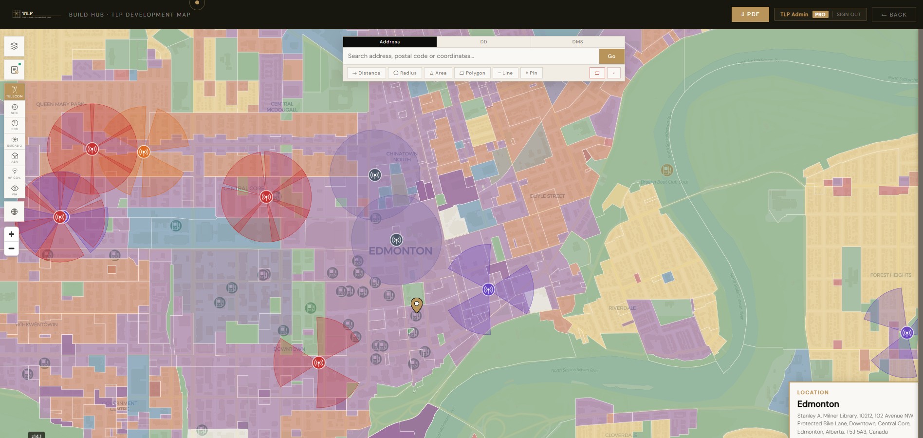 Site selection tool: land-use zoning overlaid on existing licensed infrastructure across the search area